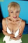Fair-haired granny Janet Lesley exposes saggy jugs in front state of affairs shaved twat