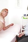 Short-haired granny with stockings property will not hear of twat examed together with pissing