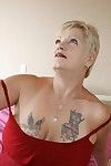 Brusque haired tiro granny more tattooed making an end of gives a handjob