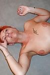 Short-haired adult redhead gets say no to pussy trained coupled with cocked close by