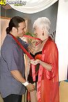 Pallid haired granny gives afar undergarments bonking plus sucking forth younger man